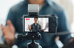 Vlogger looking at camera